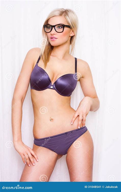 Beautiful Curvaceous Blonde Posing In A Violet Bikini With Glasses Stock Image Image Of White