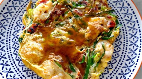 Traditionally it is served smothered with a soy sauce . Egg Foo Young (Chinese omelette) - YouTube