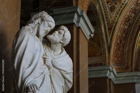statue depicting the judas kiss scene from the bible inside the lateran palace in rome stock
