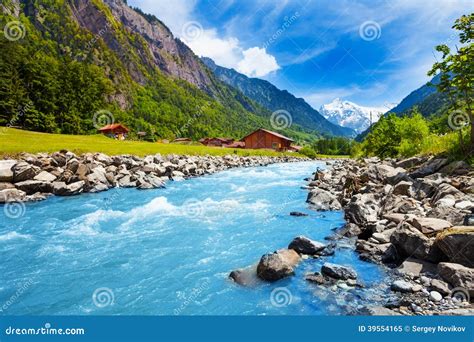 Swiss Landscape With River Stream And Houses Stock Photo Image 39554165