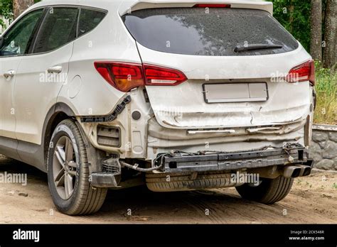 Dusty Damaged Car After An Accident Vehicle With Removed Rear Bumper