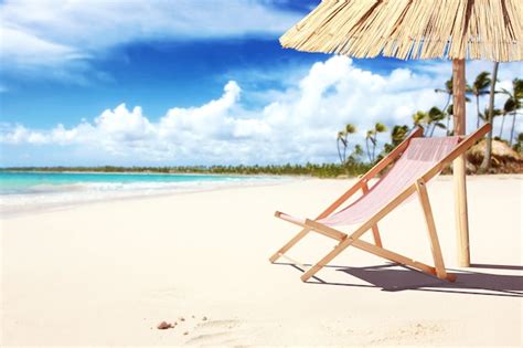 Premium Photo Wooden Deck Chairs On Sandy Beach Near Sea Holiday