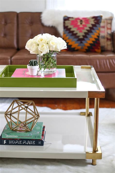 How to style a round coffee table. Styling a Coffee Table: 3 Ways - A Beautiful Mess