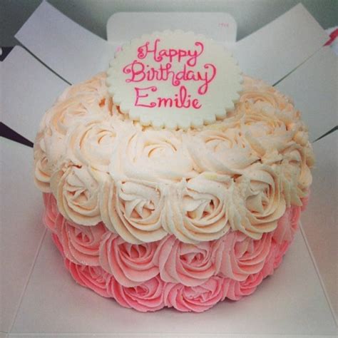 An Ombre Rose Birthday Cake With A Fondant Topper