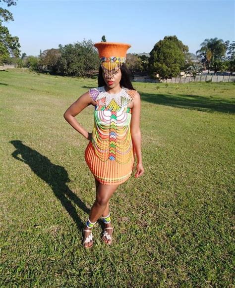 clipkulture beautiful orange zulu traditional attire with body and leg beads
