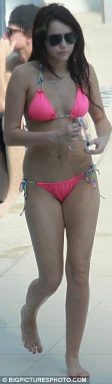 Miley Cyrus Reveals Her New Tattoo As She Parades Around In A Hot Pink Bikini Daily Mail Online