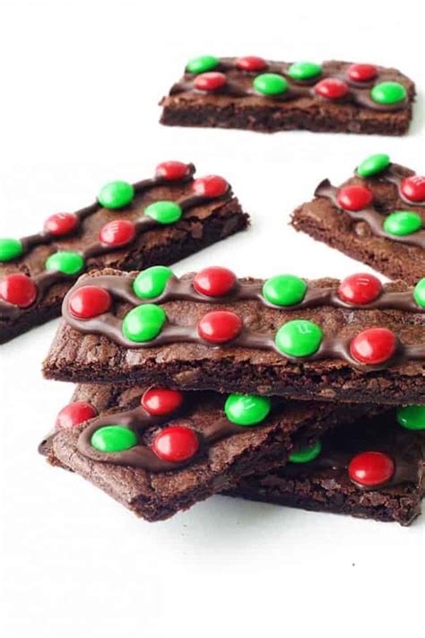 To prepare chocolate mousse, heat marshmallows, chocolate chips, and milk in a saucepan over low heat, stirring occasionally until melted. M&M Chocolate Brownie Pizza - Sweetest Menu