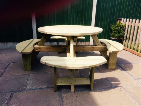 Shop for picnic tables in patio tables. 8-seater round picnic table - wooden garden furniture for ...