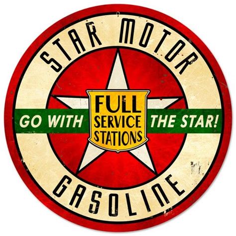 An Old Gas Station Sign With The Star Motor Gasoline Logo