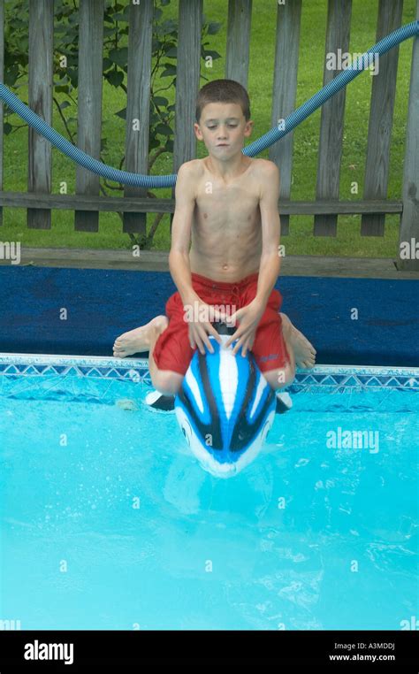 1 One Young 8 9 Eight Nine Year Old Boy Enjoys Swimming Pool Stock