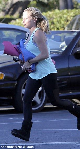 Kendra Wilkinson Struggles To Keep Surgically Enhanced Assets In Bra On Way To Gym Daily Mail