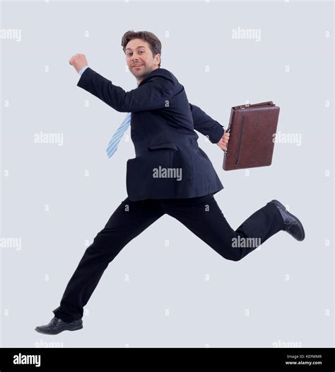 Isolated Attractive Business Man Running Away From Someone Stock Photo