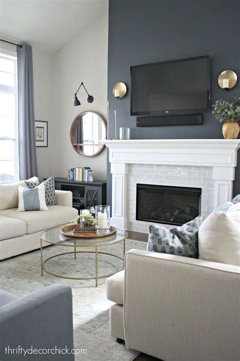 The grounds invade the living room! | Fireplace accent walls, White