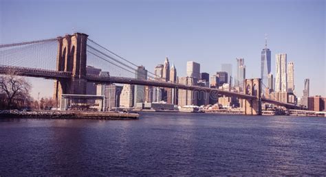 Lower Manhattan Downtown Skyline Panorama From Brooklyn Bridge Park