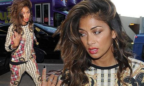 Nicole Scherzinger Looks Half Asleep As She Arrives At Lax Airport In Pyjamas Daily Mail Online