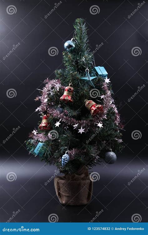 The Red and Blue Christmastree Decorations Hanging on Branches among