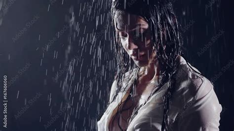 Portrait Of A Gorgeous Girl In The Rain In White Wet Clothes Her Sexy Body Dripping Cold Water