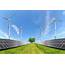 Solar Energy Panels And Wind Turbines On Meadow Alternative Ene 