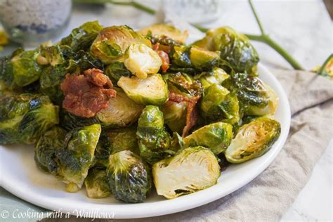 Add bacon and roasted garlic to the brussel sprouts. Roasted Garlic Brussels Sprouts with Bacon - Cooking with ...