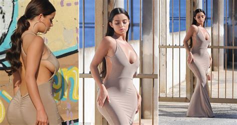 Demi Rose Showcases Her Captivating Curves And Alluring Sideboob In A Form Fitting Nude Dress