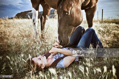 Cowgirl Lying Down Photos And Premium High Res Pictures Getty Images
