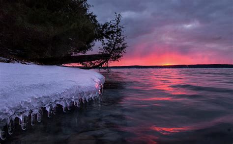 Higgins Lake Icicle Late Winter Sunset Photograph By Ron Wiltse