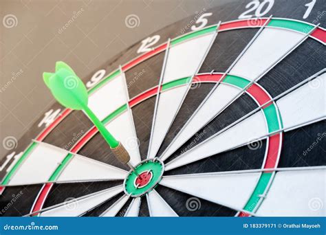 The Arrow In The Middle Of The Dartboard Demonstrate The Concept Of A