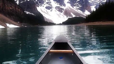 Canoeing Over Lake Moraine Canada Youtube