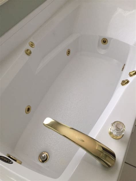 .slipper bath tubs, brushed nickel features: Older jetted tub with brass fixtures (ceiling, tile ...