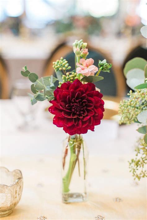 Would you use the same flowers if you had to do it again? Sweet little bud vase filled with a burgundy dahlia, peach ...
