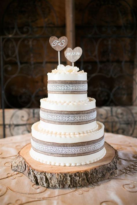 Wedding Cake With Burlap And Lace And Custom Wood Heart Topper