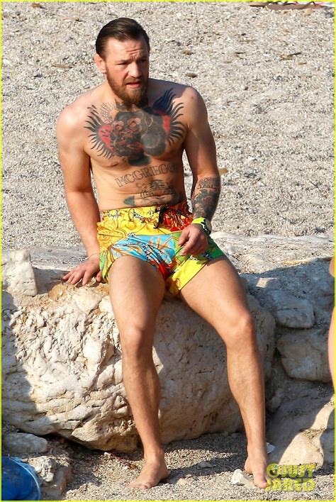 newly retired conor mcgregor wears colorful swim shorts at the beach in france photo 4469961
