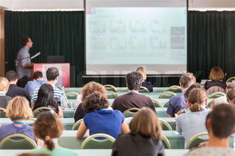 Audience In Lecture Hall Participating At Scientific Conference