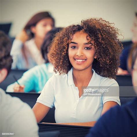 Beautiful African American Teen Girl In Private High School Classroom Photos And Premium High