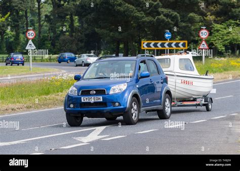 Car Towing Trailer Hi Res Stock Photography And Images Alamy