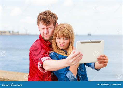 Young Couple Taking Self Picture Selfie With Tablet Stock Image Image Of Beach Women 116663683