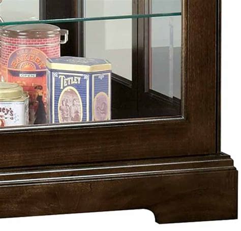 The Howard Miller Tyler III Curio Cabinet With Free In Home