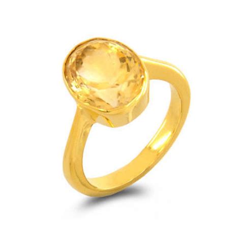 Yellow sapphire engagement rings feature stones that resemble yellow diamonds and tend to have fewer inclusions than pink or blue sapphires. Oval Transparent Yellow Sapphire Ring, 9.92 Carat, Rs ...