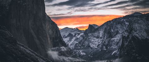 2560x1080 Mountain Range Peak Ice Cliff Scenery Landscape 5k Wallpaper