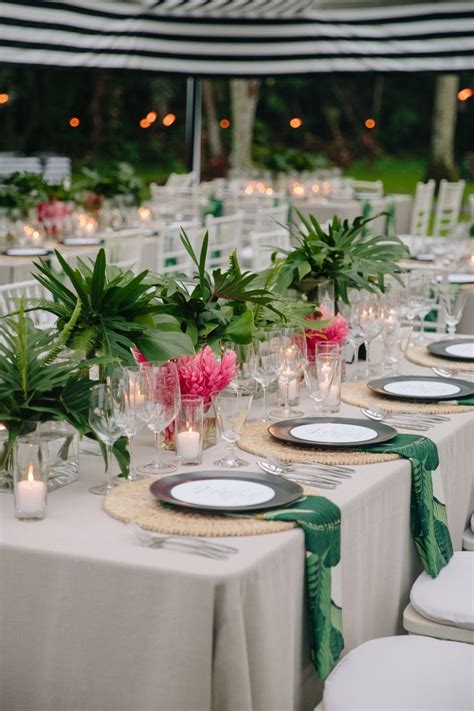 Palm leaves are a great tropical wedding theme idea because they automatically will make your guests feel like they are on vacation. The Ultimate Tropical Leaf Wedding Décor: Palm Leaves ...