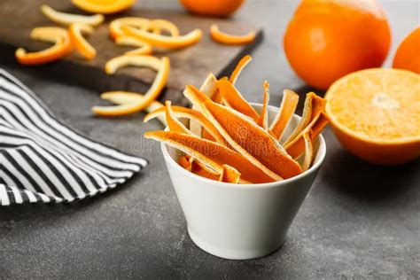 Dry Orange Fruit Peels On Grey Table Stock Image Image Of Group