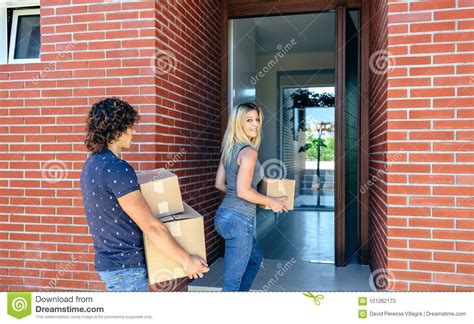 Couple Moving Into Their New Home Stock Image Image Of Abode