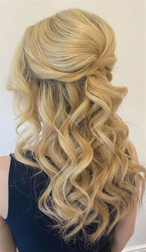 40 Best Prom Hairstyles For 2023 Curly Wave Textured Half Up Half Down