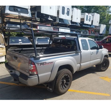 With toyota tacoma ladder racks, you will find it significantly easier to bring a ladder with you, whether to a job site or to go help out a friend who doesn't own one. ColminnX-Ladder-Rack-2015-Tacoma - Suburban Toppers