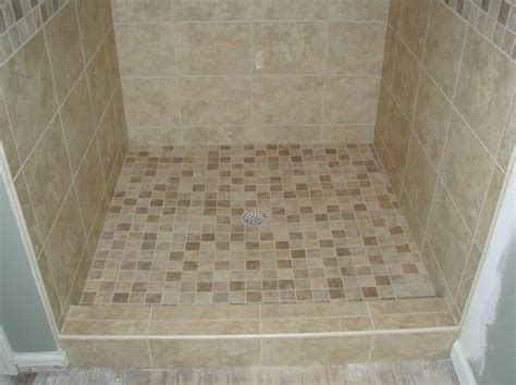 The major cost for demolishing an old bathroom is the cost to remove all the tiles. Marvelous How To Tile A Shower Floor With River Rock and ...