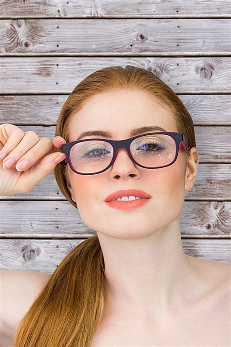 Composite Image Of Beautiful Redhead Posing With Glasses