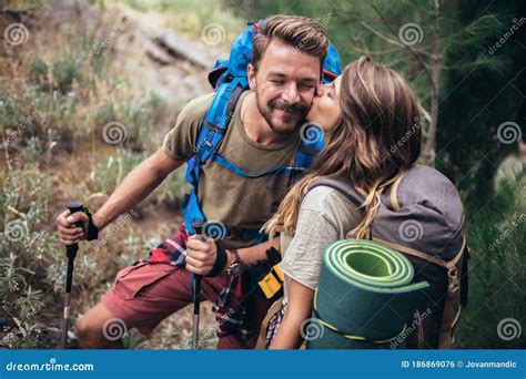 Couple Hiking On The Path In Mountains Stock Photo Image Of Friends