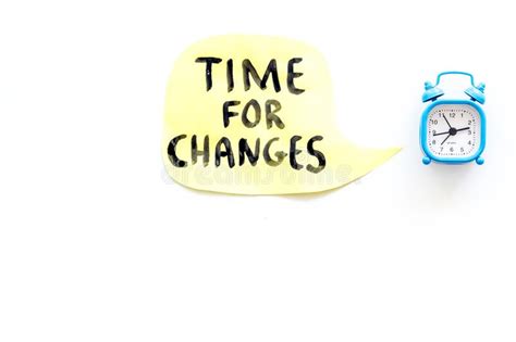 Time For Changes Hand Lettering Near Alarm Clock On White Background