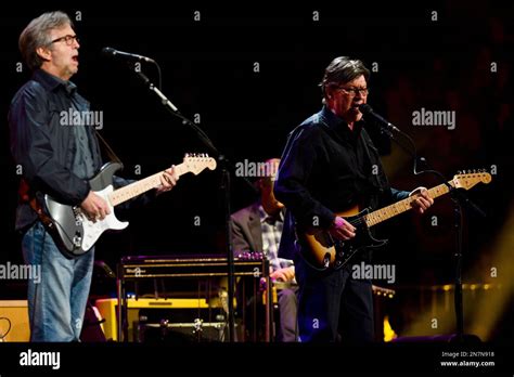 Eric Clapton Left And Robbie Robertson Perform At Eric Claptons
