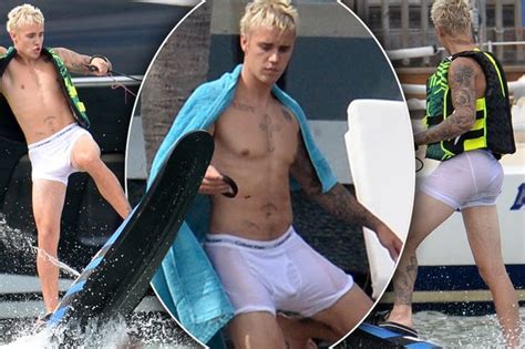 Justin Bieber Flashes Bum In Soaking White Pants As He Gets Wet And